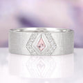 Elowen Morganite Couples Ring Set by Aquamarise featuring a textured silver band with a central kite-shaped pink morganite stone framed by sparkling simulated diamonds, perfect for matching couples’ rings and meaningful jewelry gifts.