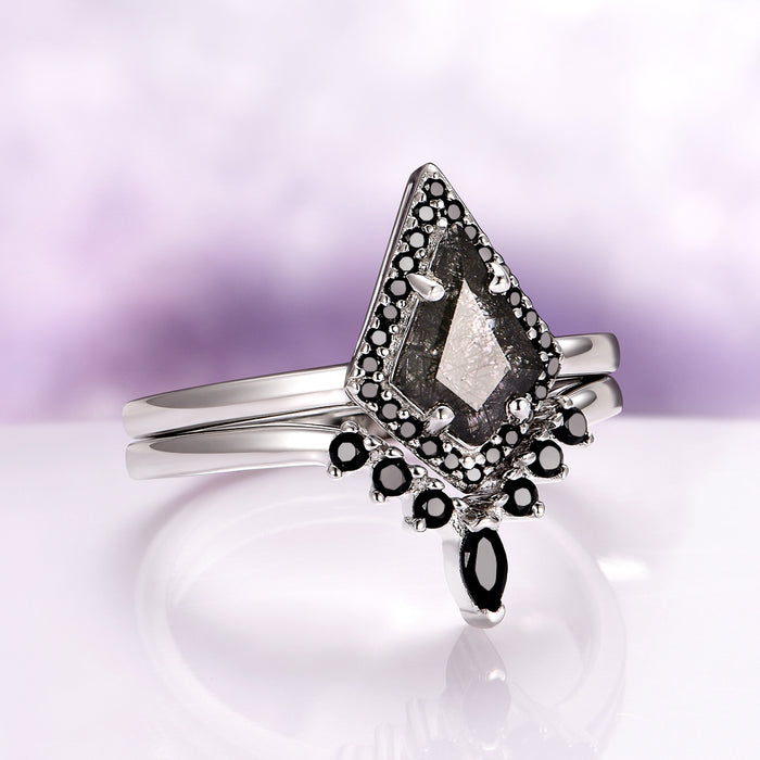 Rutilated Quartz & Black Onyx Engagement Ring Set in 14K White Gold by Aquamarise Gold featuring a kite-cut rutilated quartz center with black onyx accents on polished white gold bands.