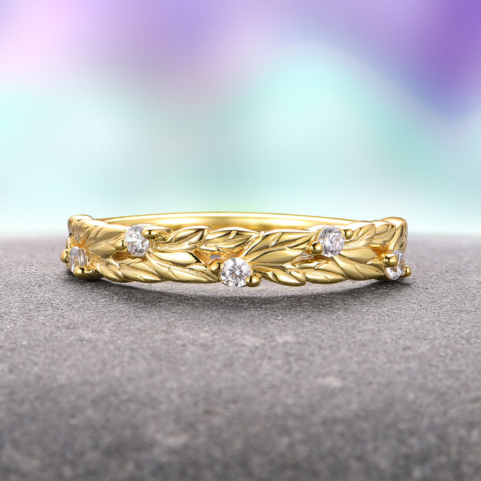 Diamond Leaf Wedding Band in Solid 14K Yellow Gold by Aquamarise Gold, showcasing intricately carved leaf patterns accented with sparkling diamonds, a graceful symbol of love and nature-inspired elegance in women’s wedding bands.