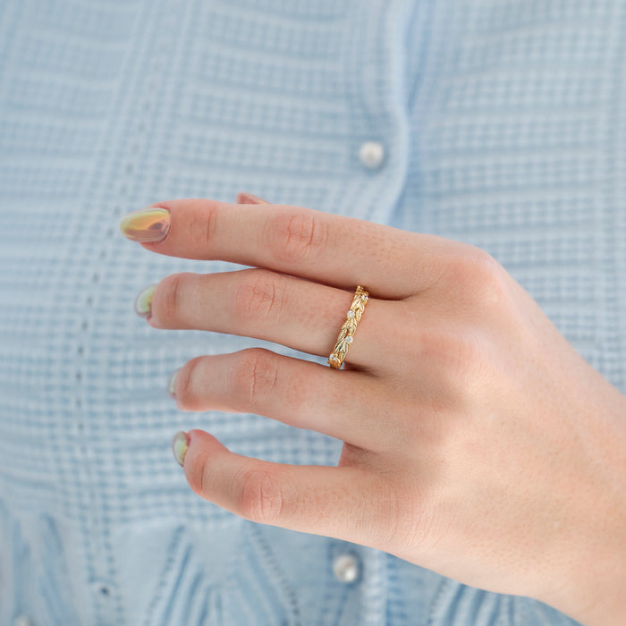 Diamond Leaf Wedding Band in Solid 14K Yellow Gold by Aquamarise Gold, featuring a delicate vine and leaf design with scattered diamonds, symbolizing nature-inspired commitment, perfect for women’s wedding bands and meaningful jewelry gifts.