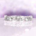 Leaf Diamond Wedding Band in 14K White Gold by Aquamarise Gold, featuring detailed engraved leaf motifs accented with sparkling diamonds, a nature-inspired design perfect for women’s wedding bands and meaningful gifts.