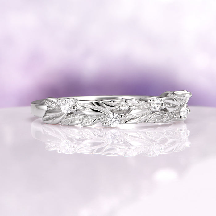 Leaf Diamond Wedding Band in 14K White Gold by Aquamarise Gold, showcasing an intricate vine and leaf design accented with small sparkling diamonds, reflecting nature-inspired elegance from the Women’s Wedding Bands collection.