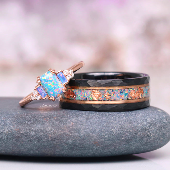 Light Blue Fire Opal & Rose Gold Leaf Wedding Band- 8MM Black Tungsten featuring crushed opal and rose gold inlay, paired with a delicate rose gold ring with vibrant blue fire opal by Aquamarise.