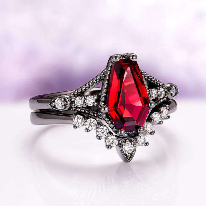 Lilith Coffin Cut Natural Red Garnet Couples Ring Set featuring a striking garnet center stone with black finish band and sparkling accent diamonds by Aquamarise, perfect matching couple rings.