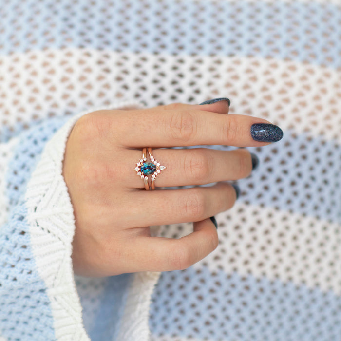 Lunette Teardrop Alexandrite Ring Set in 14K Rose Gold Vermeil by Aquamarise, featuring a pear-shaped alexandrite center and diamond accents on a styled hand with knit background