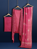 Magenta katan silk unstitched suit set with cream botanical hand block print and a lengthwise printed border on the dupatta