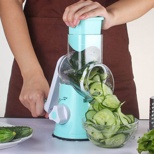 Manual Kitchen Accessories multifunctional mandoline vegetable slicer in use, slicing cucumbers with ease.