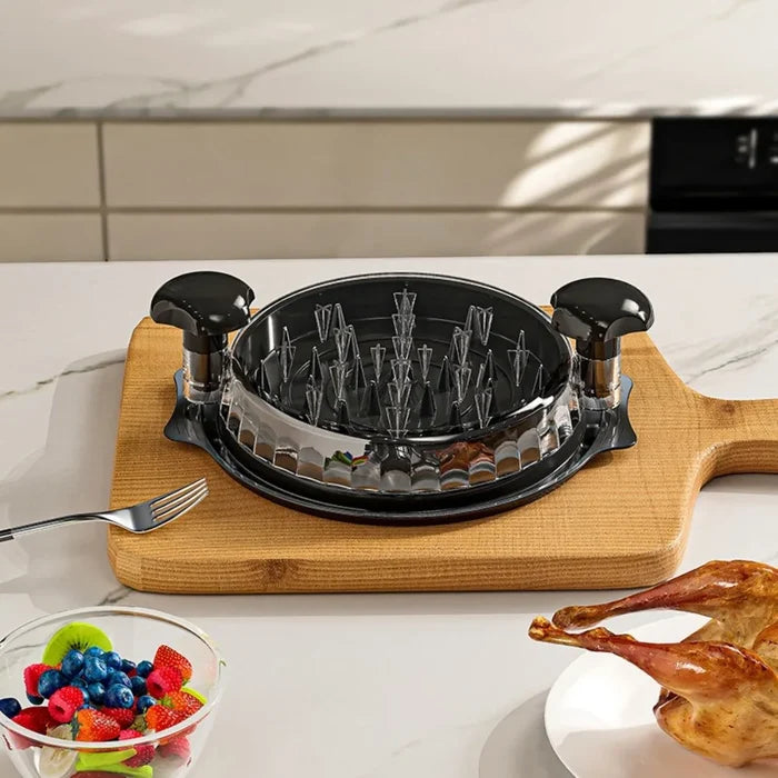 Manual meat shredder for chicken and beef on a kitchen countertop, perfect for shredding cooked meats easily.
