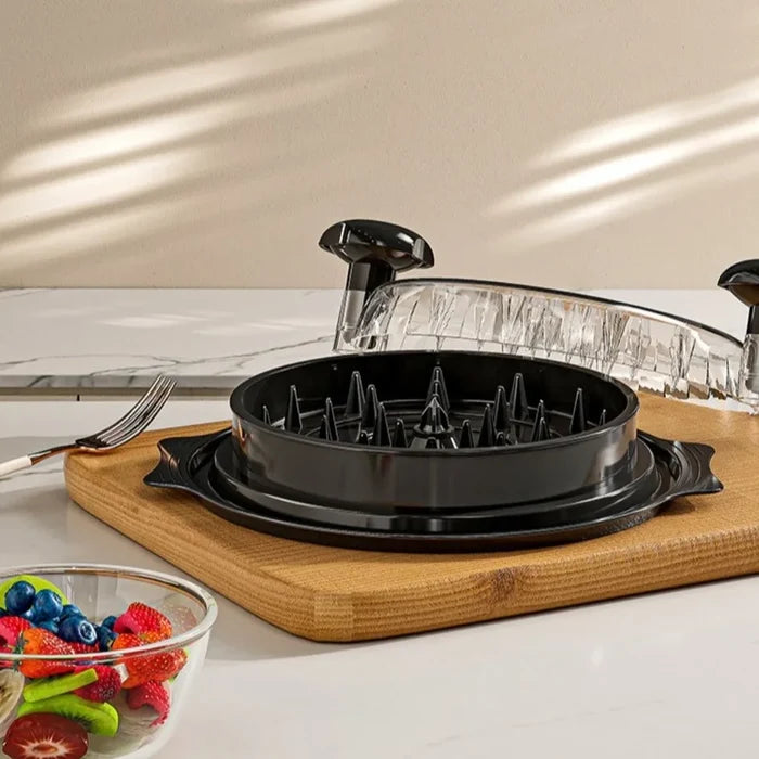 Manual meat shredder for chicken and beef on a cutting board, showcasing its innovative design and ease of use.