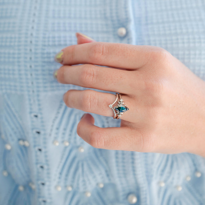 Midnight Blue Moissanite Crescent Moon Engagement Ring Set in 14K White Gold by Aquamarise Gold, showcasing a marquise-cut deep blue moissanite center with delicate crescent moon accents and small diamond details, part of Solid Gold Engagement Rings and Meaningful Jewelry Gifts collections.