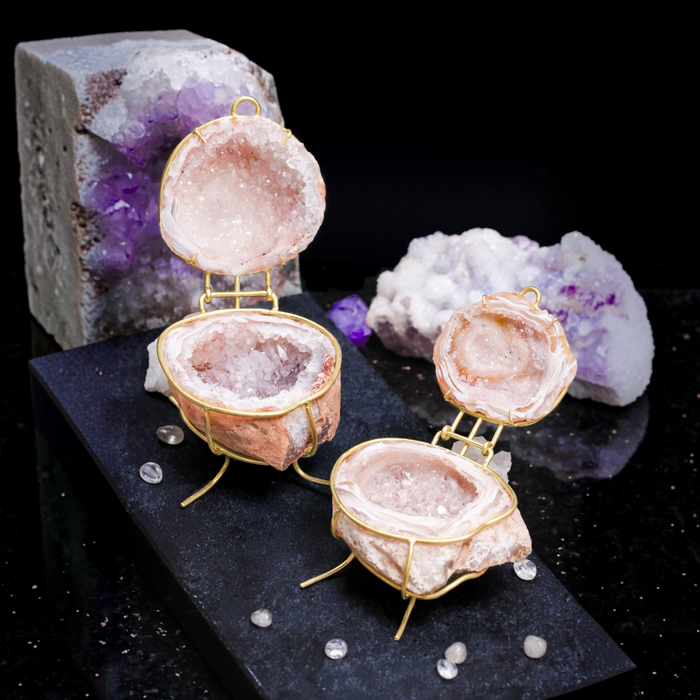 Mini Natural Geode Ring Box with Gold Hinge in Rose Blush Pink by Aquamarise, opened to show the pink crystal interior