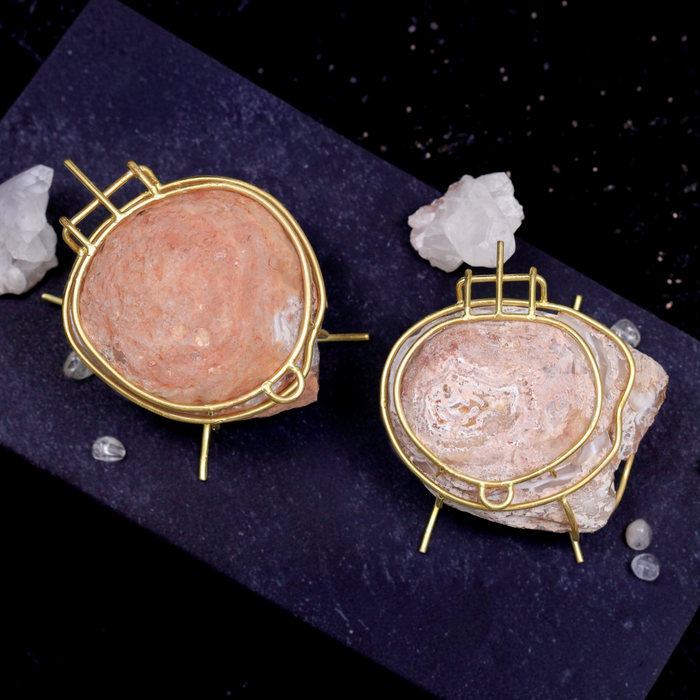 Mini Natural Geode Ring Box in Rose Blush Pink by Aquamarise, opened to show the pink crystal interior and gold hinge