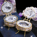 Mini Natural Geode Ring Box with Gold Hinge in Smoke Agate Grey by Aquamarise, opened to show the grey crystal interior