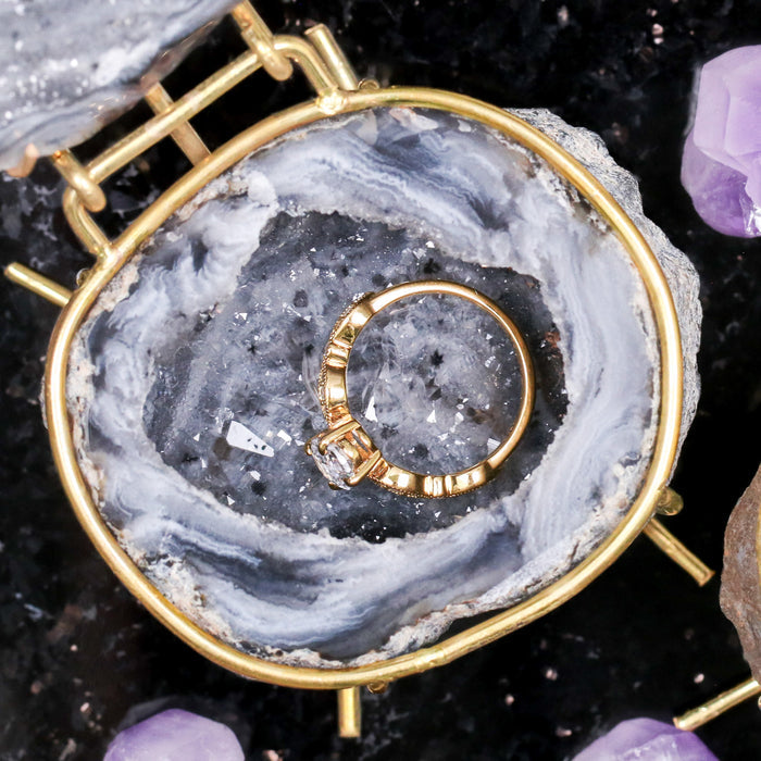 Smoke Agate Grey natural geode ring box by Aquamarise, opened to reveal the crystal-lined interior and ring slot