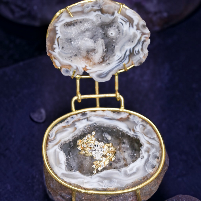 Mini natural geode ring box with gold hinge by Aquamarise, showing grey agate exterior and crystal interior