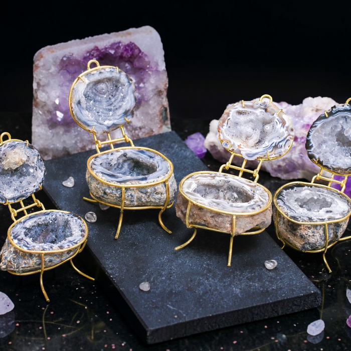 Mini natural geode ring box by Aquamarise with raw agate stone exterior and sparkling crystal interior