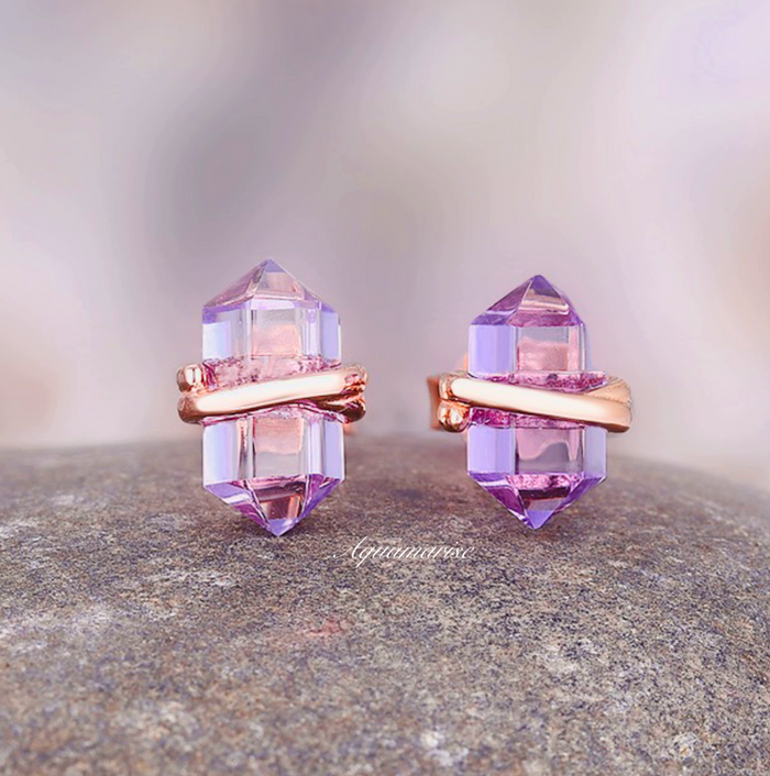 Minimalist Raw Alexandrite Stud Earrings in 14K Rose Gold Vermeil by Aquamarise featuring faceted raw lilac alexandrite crystals wrapped in polished rose gold for subtle June birthstone elegance.