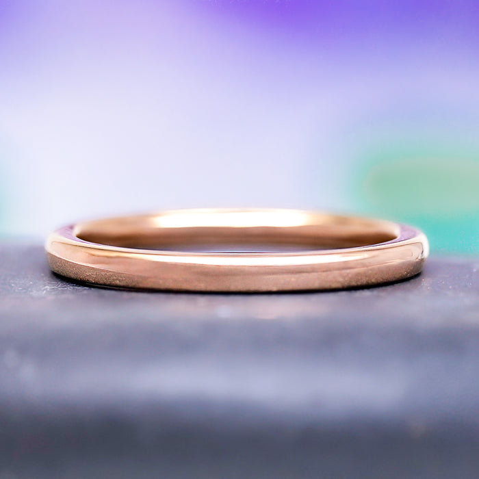 Minimalist Wedding Band in Rose Gold Tungsten (2mm) by Aquamarise, featuring a slim polished rose gold tungsten carbide band with a comfort-fit design, part of Men’s and Women’s Wedding Bands and Meaningful Jewelry Gifts collections.