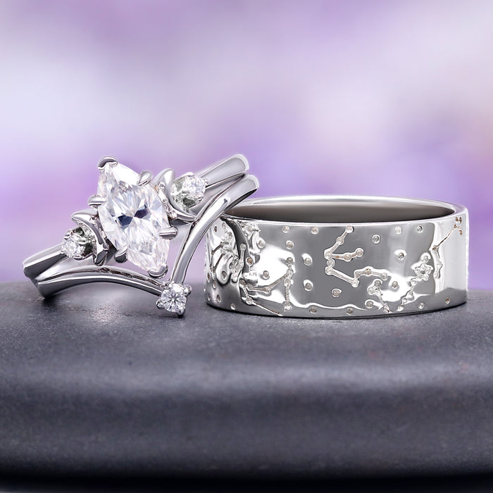 Moissanite & Crescent Moon Constellation Couples Ring Set by Aquamarise, featuring sterling silver bands with marquise center stone and engraved constellation designs for matching couples.