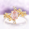 Pink Lab-Grown Diamond Fairy Leaf Engagement Ring in 14K Solid Yellow Gold (IGI Certified) featuring an oval pink diamond center stone surrounded by delicate leaf-inspired branches with sparkling white diamonds, crafted by Aquamarise Gold.