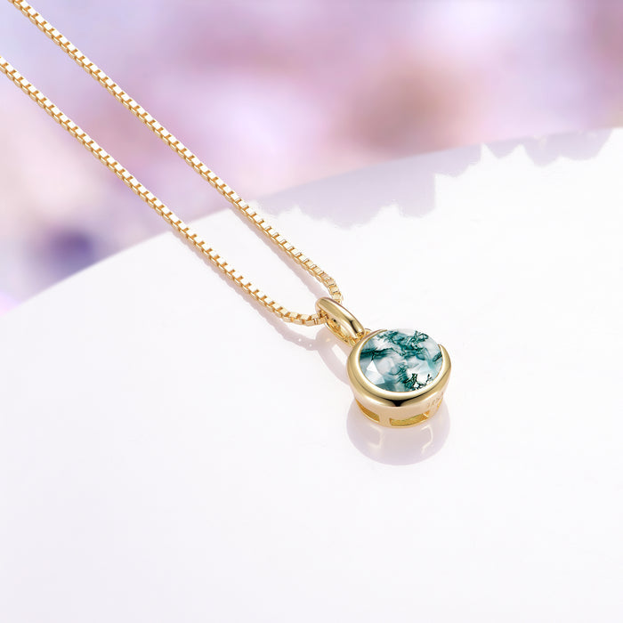 Moss Agate Crescent Moon Necklace in 14K Yellow Gold Vermeil by Aquamarise, showcasing a natural round moss agate gemstone set in a smooth gold vermeil crescent moon pendant on a fine gold chain, part of Moss Agate Jewelry and Meaningful Jewelry Gifts collections.