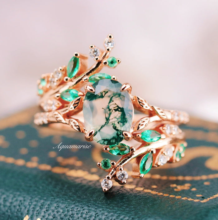 Emerald Leaf Ring Guard in 14K Solid Rose Gold featuring a nature-inspired design with intricate leaves, vine motifs, lab-grown emeralds, and delicate sparkling accents by Aquamarise Gold