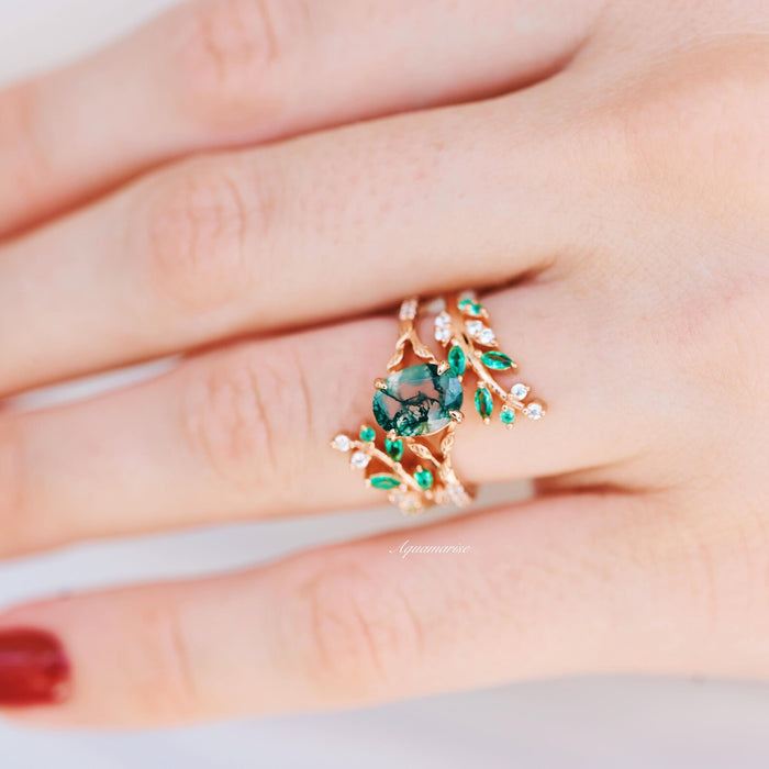 Emerald Leaf Ring Guard in 14K Solid Rose Gold by Aquamarise Gold with intricate green emerald leaves and vine details, a unique nature-inspired design for women’s wedding bands and birthstone jewelry.