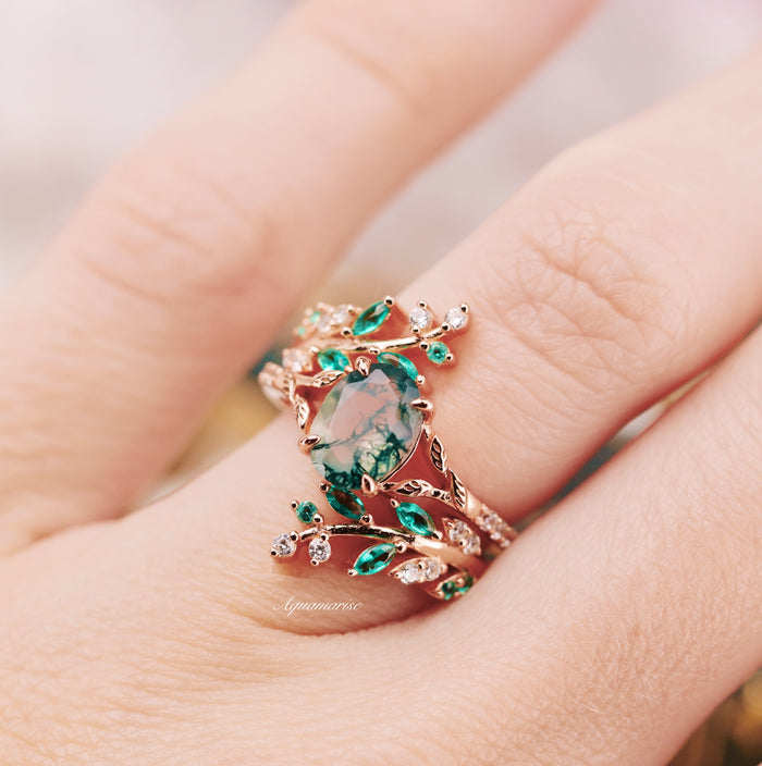 Emerald Leaf Ring Guard in 14K Solid Rose Gold with marquise and round lab-grown emerald accents and intricate vine detailing by Aquamarise Gold, a nature-inspired women’s wedding band.