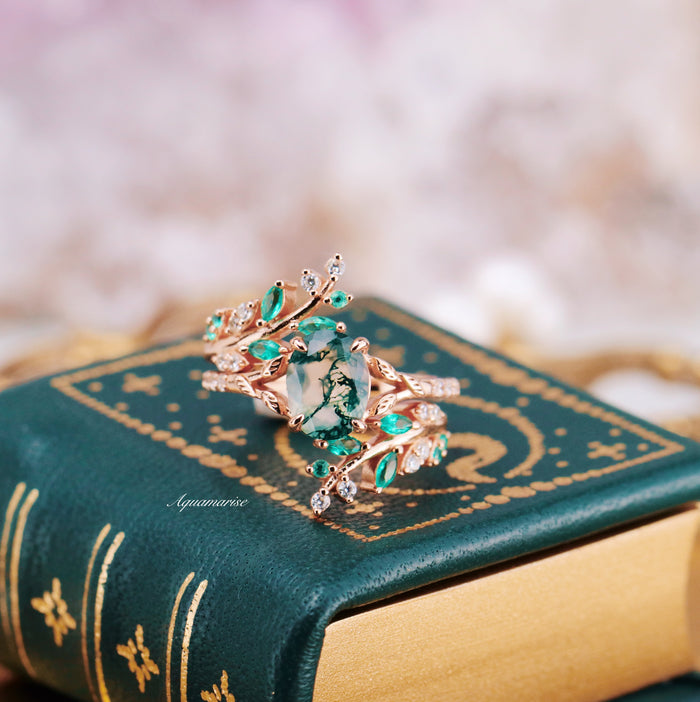 Emerald Leaf Ring Guard in 14K Solid Rose Gold by Aquamarise Gold featuring vine and leaf motifs with sparkling green accents, perfect for women’s wedding bands and meaningful jewelry gifts.
