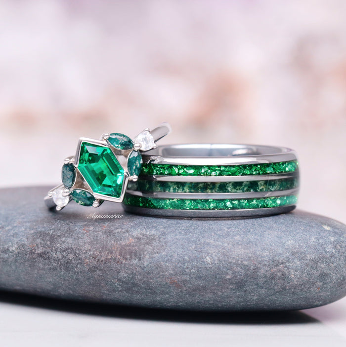 Moss Agate & Emerald Wedding Band- 8MM Tungsten featuring crushed emerald and moss agate inlays alongside a silver ring with emerald and white stones, crafted by Aquamarise.