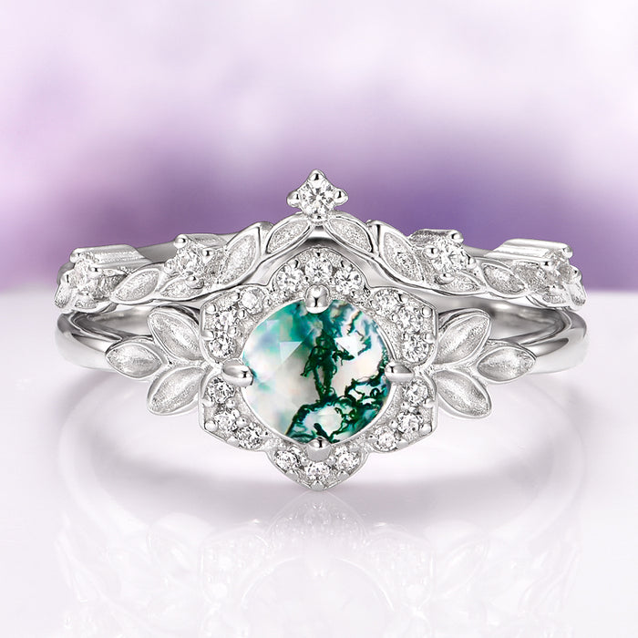 Moss Agate Fairy Leaf Ring Set in 14K White Gold by Aquamarise Gold, featuring a green moss agate center surrounded by leaf and diamond accents, embodying nature-inspired elegance.
