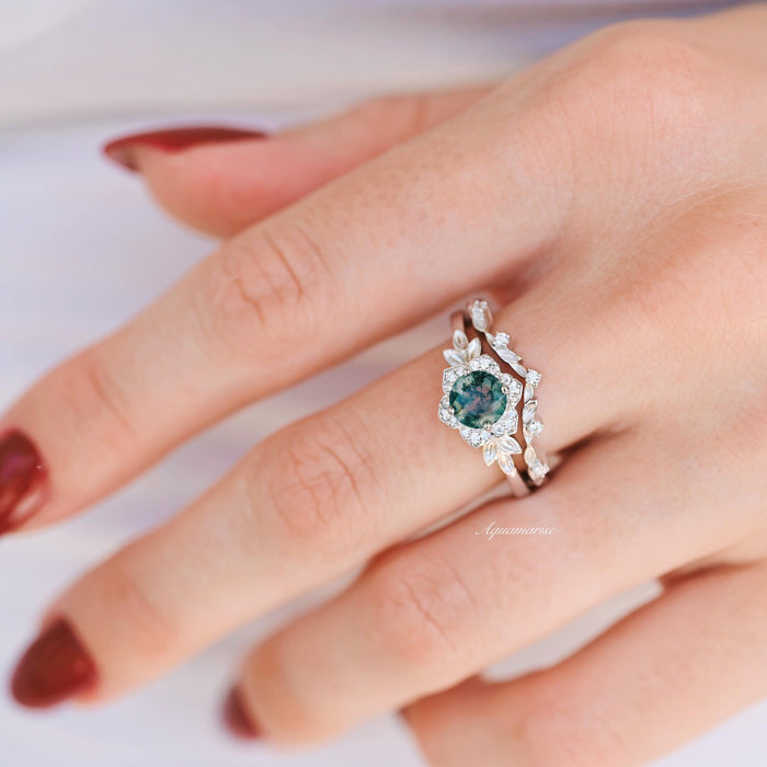 Moss Agate Fairy Leaf Ring Set in 14K White Gold by Aquamarise Gold featuring a green moss agate center with delicate leaf and diamond accents in an elegant nature-inspired design.