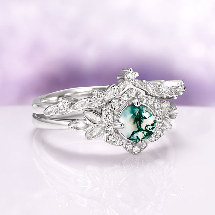 Moss Agate Fairy Leaf Ring Set in 14K White Gold featuring green moss agate center surrounded by diamond accents and delicate leaf motifs by Aquamarise Gold in a fantasy-inspired design.
