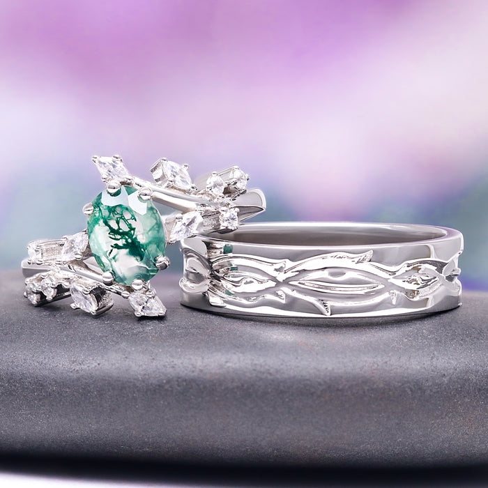 Green Moss Agate Leaf Engagement Ring in 14K White Gold by Aquamarise Gold, featuring an oval moss agate surrounded by nature-inspired diamond accents and a matching white gold band.