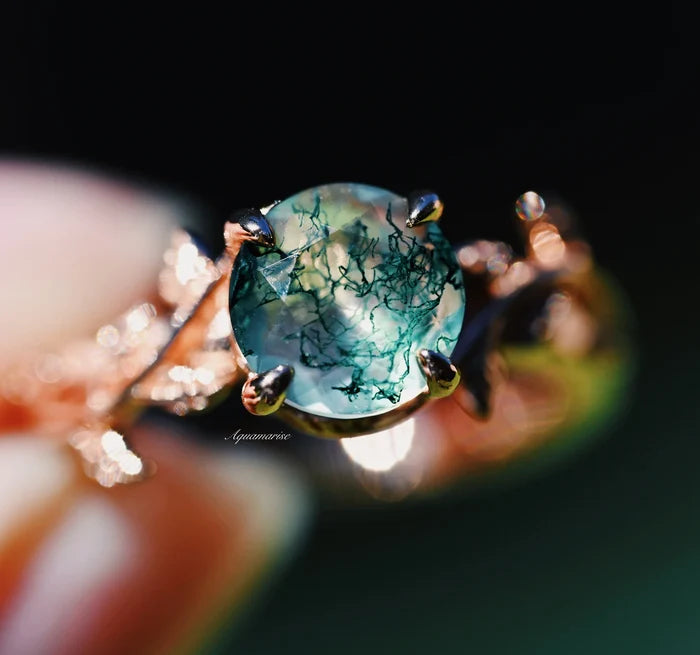 Moss Agate Leaf Ring in 14K Rose Gold Vermeil with a round natural green moss agate stone set in an intricate leaf-inspired rose gold vermeil band by Aquamarise.
