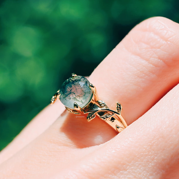 Moss Agate Leaf Ring in 14K Yellow Gold Vermeil by Aquamarise, featuring a round green moss agate set in a nature-inspired leaf detailed yellow gold vermeil band.