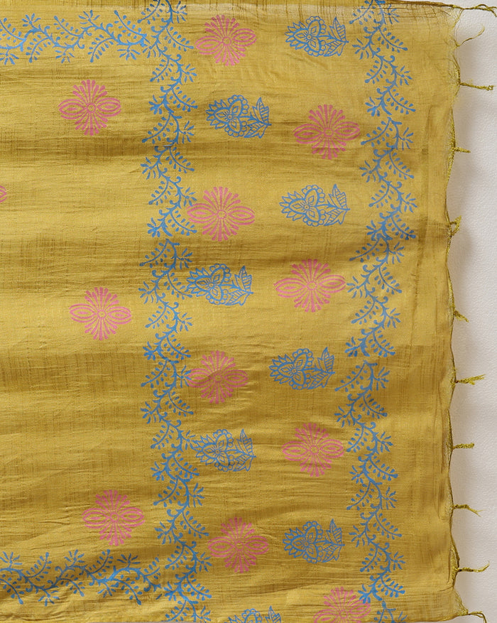 Mustard yellow katan silk unstitched suit set with sparse pink and blue floral hand block print and a raw fringed dupatta edge
