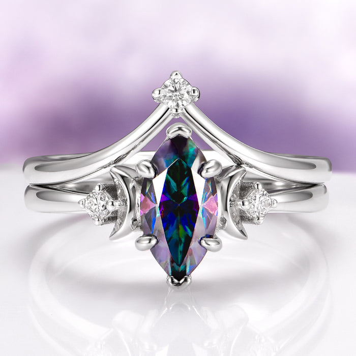 Mystic Moissanite Engagement Ring Celestial Moon Ring over light purple background
