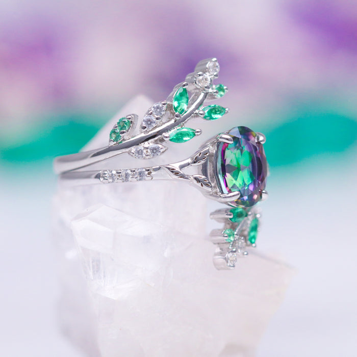 Oval Cut Mystic Topaz Engagement Ring in 14K White Gold by Aquamarise Gold, featuring leaf-inspired design with green and white accent stones from the Solid Gold Engagement Rings collection.