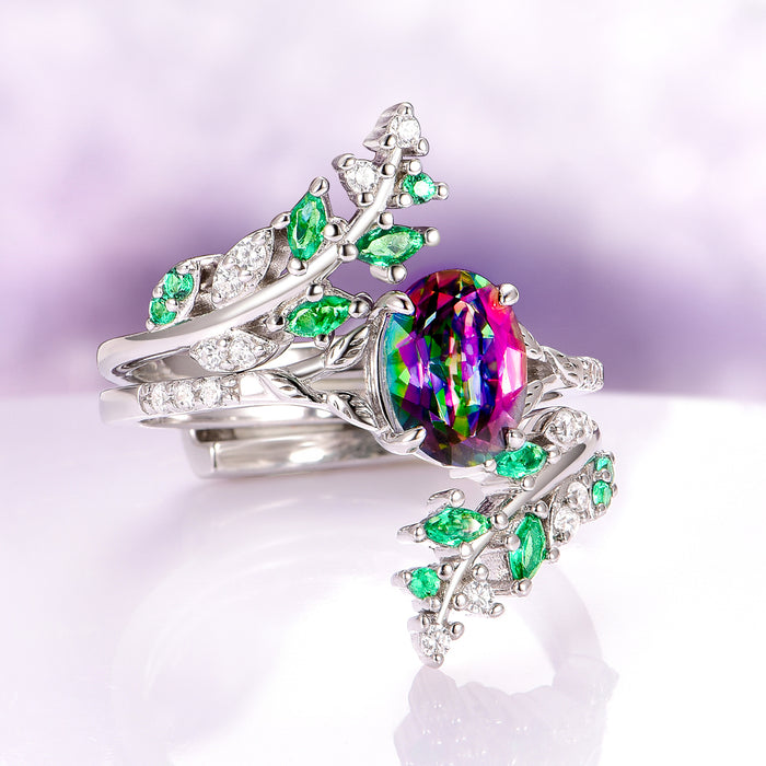 Mystic Topaz & Galaxy Opal Leaf Couples Ring Set featuring vibrant multicolor topaz and green leaf accents by Aquamarise, elegant matching rings symbolizing love and nature’s beauty.