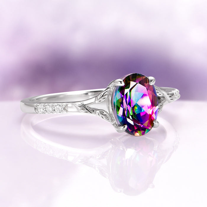 Mystic Topaz & Galaxy Opal Leaf Couples Ring Set featuring a vibrant mystic topaz gemstone with intricate leaf details and diamond accents by Aquamarise.