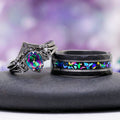 Mystic Topaz & Galaxy Opal Wedding Band in Tungsten Carbide (8mm) by Aquamarise, featuring a colorful mystic topaz and vibrant galaxy opal inlay on a black faceted band.