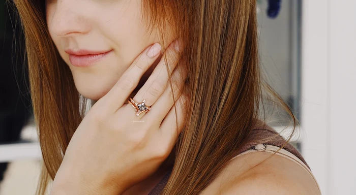Princess Cut Rutilated Quartz Engagement Ring Set in 14K Solid Rose Gold on a woman’s hand, featuring a modern design by Aquamarise Gold from the Solid Gold Engagement Rings collection.
