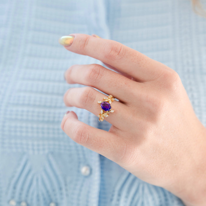 Amethyst and Galaxy Fire Opal Leaf Couples Ring Set by Aquamarise featuring an oval purple amethyst center with delicate gold leaf details and sparkling opal accents, part of Matching Couples' Rings and Birthstone collections.