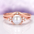 Natural Freshwater Pearl Ring Set in 14K Rose Gold Vermeil by Aquamarise featuring a luminous pearl centerpiece with sparkling accents on a vintage-inspired rose gold vermeil band.