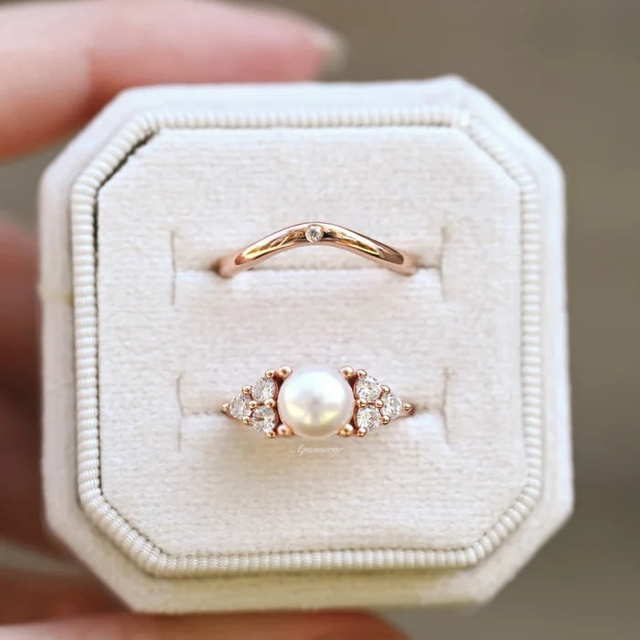 Natural Freshwater Pearl Ring Set in 14K Rose Gold Vermeil by Aquamarise, featuring a classic pearl centerpiece with delicate sparkling accents and a simple complementary band in rose gold vermeil.