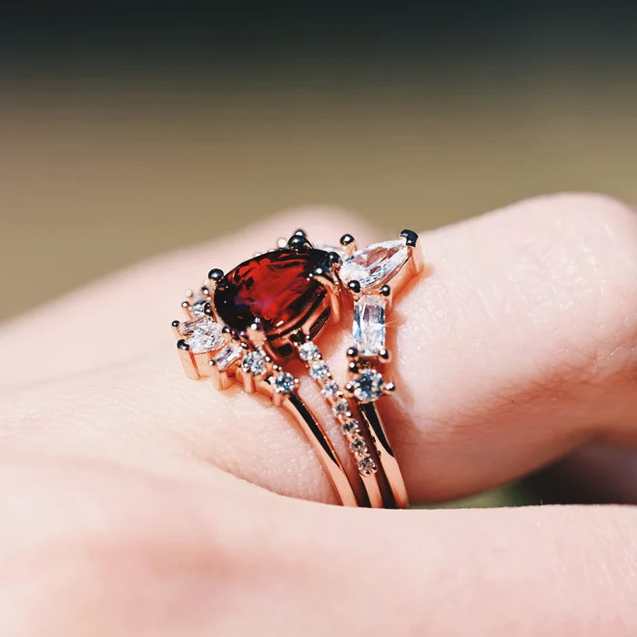 Natural Garnet 3pcs Ring Set- 14K Rose Gold Vermeil by Aquamarise, featuring a pear-shaped garnet with sparkling white accents on elegant rose gold vermeil bands.