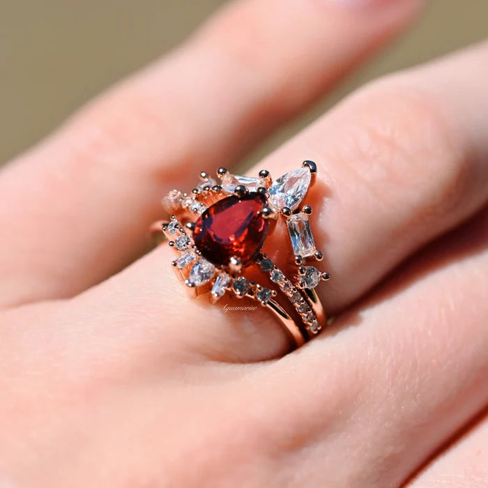 Natural Garnet 3pcs Ring Set- 14K Rose Gold Vermeil by Aquamarise, featuring a pear-shaped garnet with vintage-inspired white stone accents on elegant rose gold vermeil bands.