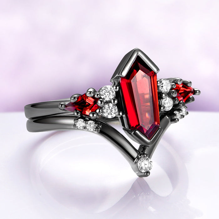 Natural Garnet & Red Fire Opal Couples Ring Set by Aquamarise with black ruthenium band, coffin-shaped garnet center stone, red fire opal accents, and sparkling diamond details.