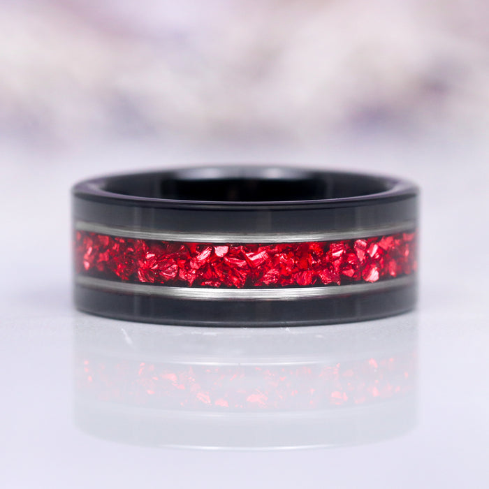 Natural Red Garnet Couples Ring Set featuring a bold black band inlaid with vibrant crushed red garnet stones, showcasing a modern and striking design by Aquamarise, perfect for matching couples and meaningful jewelry gifts.